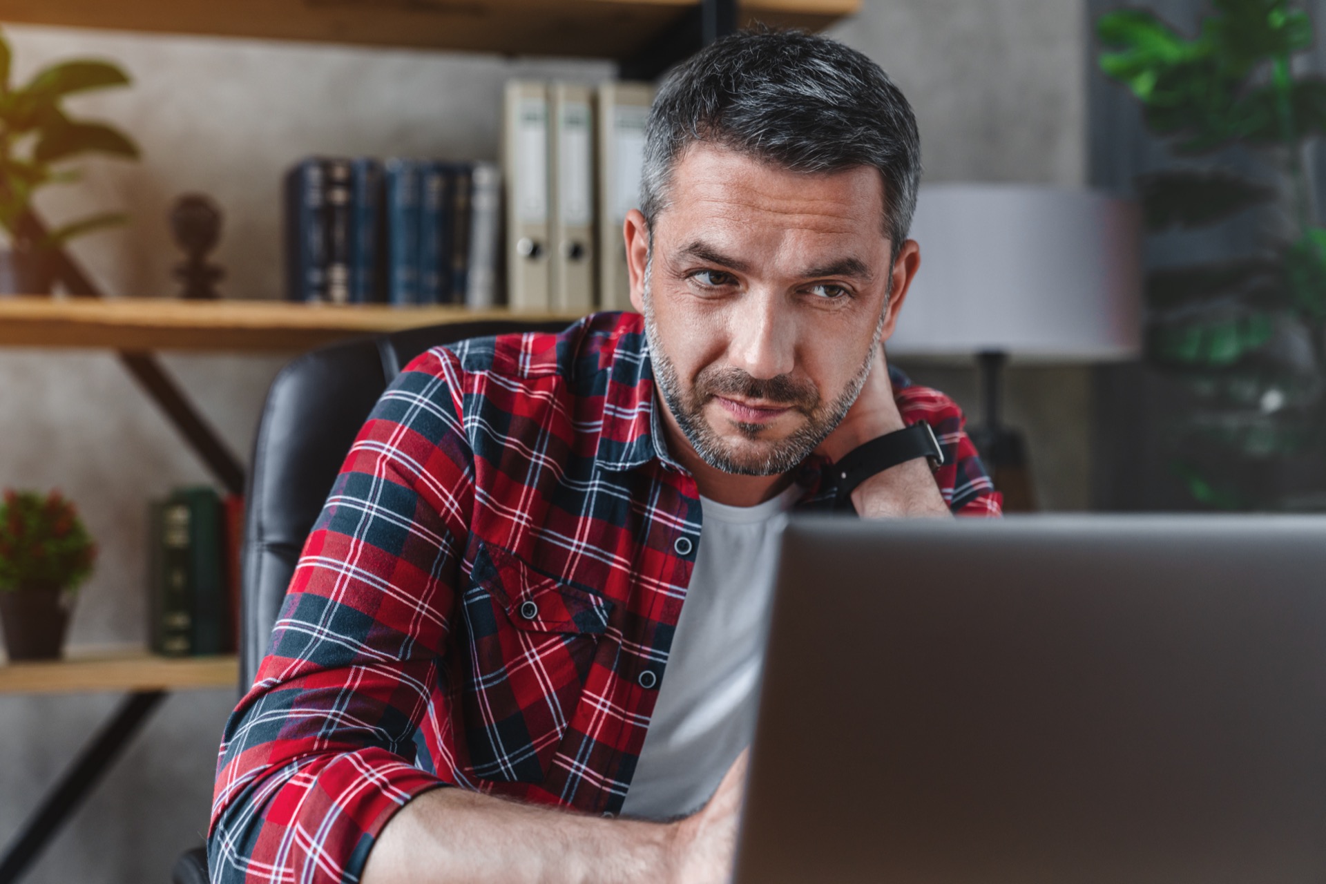 Frustrated business owner struggling with website problems