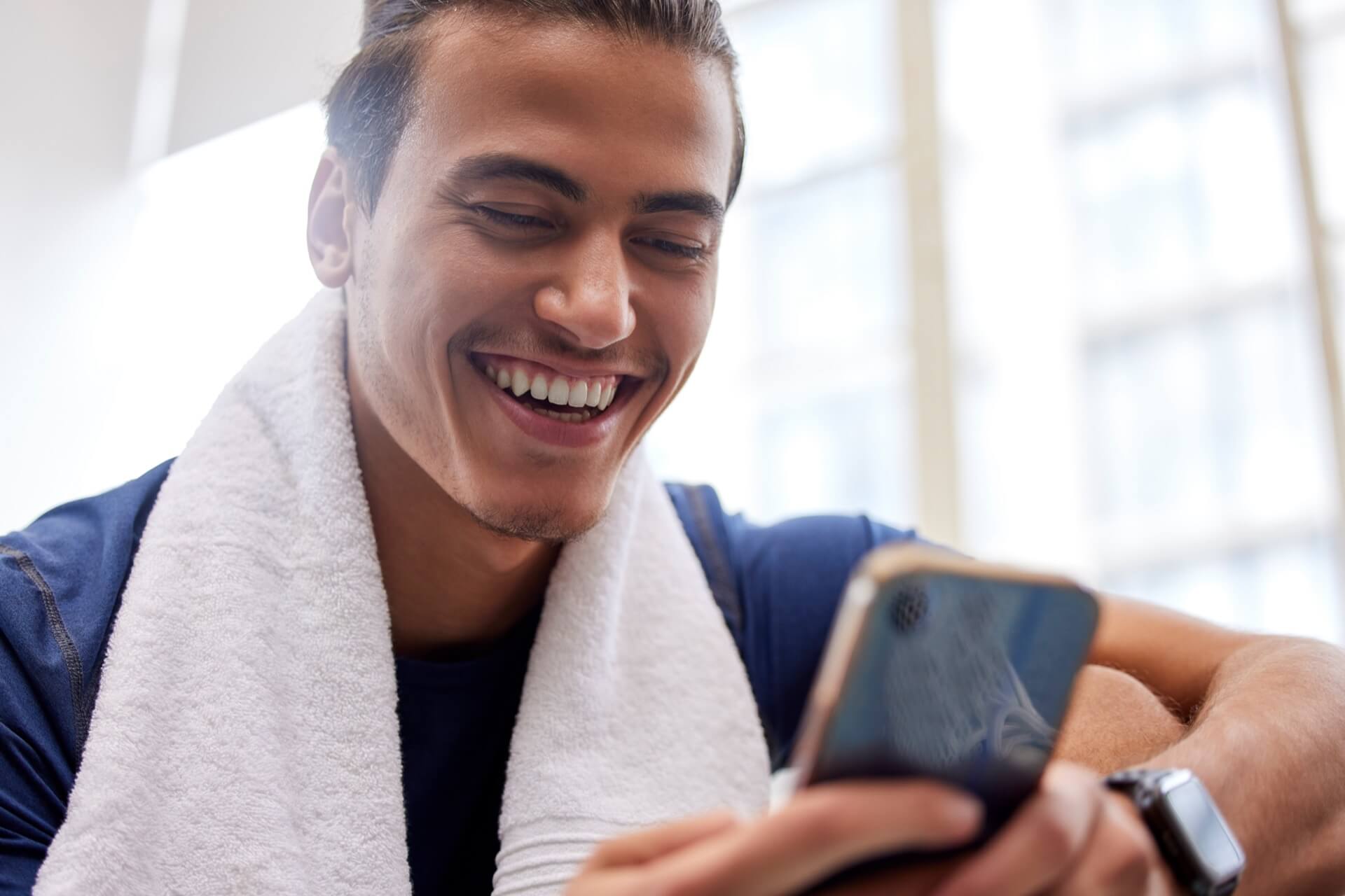 A fitness gym owner looking for web services for fitness gyms on his smartphone