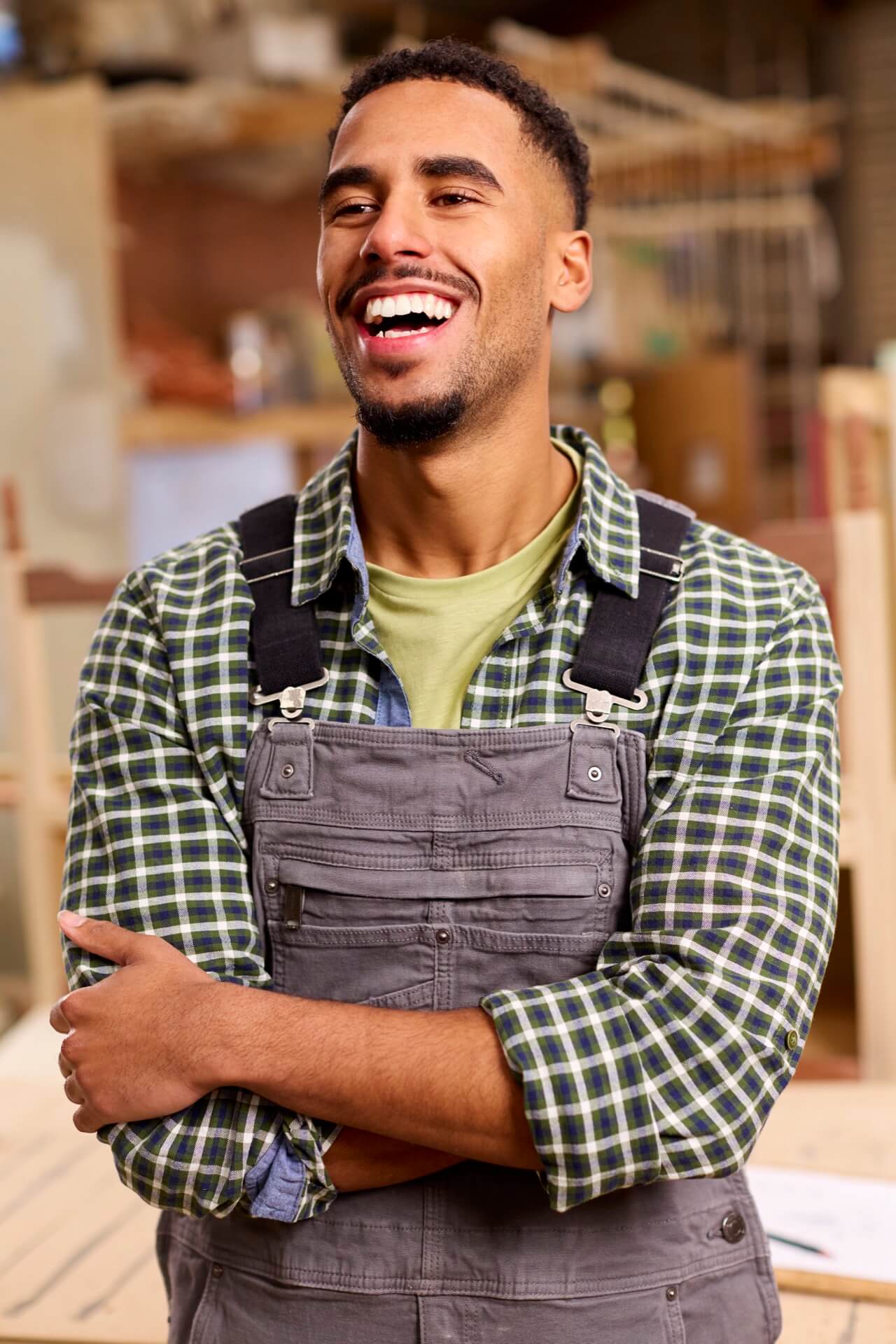 Owner of contracting company smiling after web design complete by Noble Digital