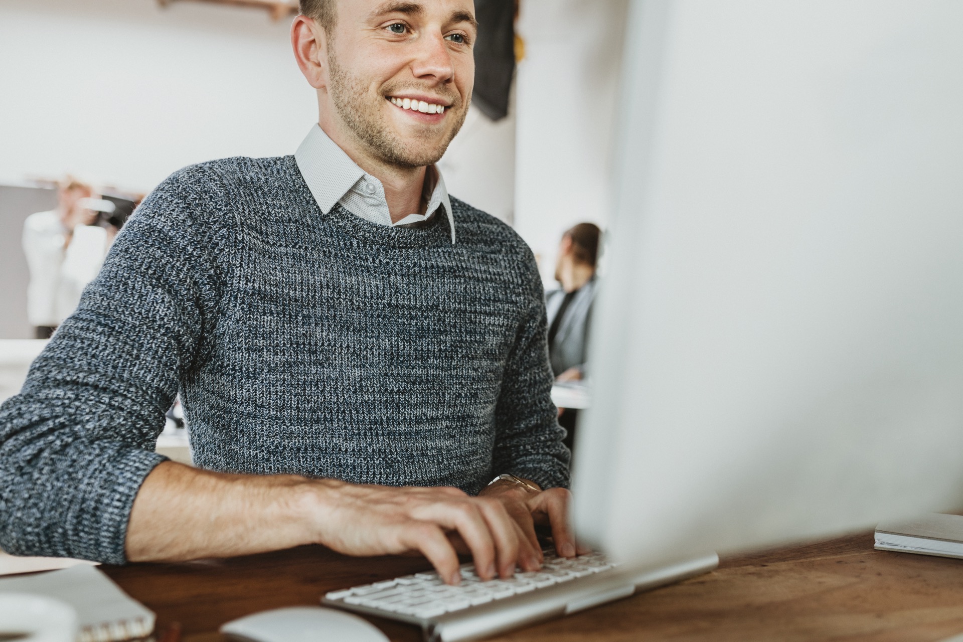 Happy Grand Forks business owner with new professional website